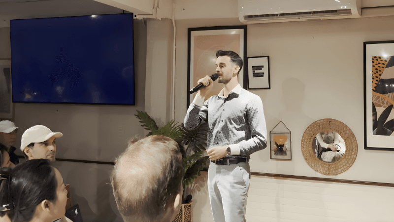 Image of Blair leading a toastmasters session